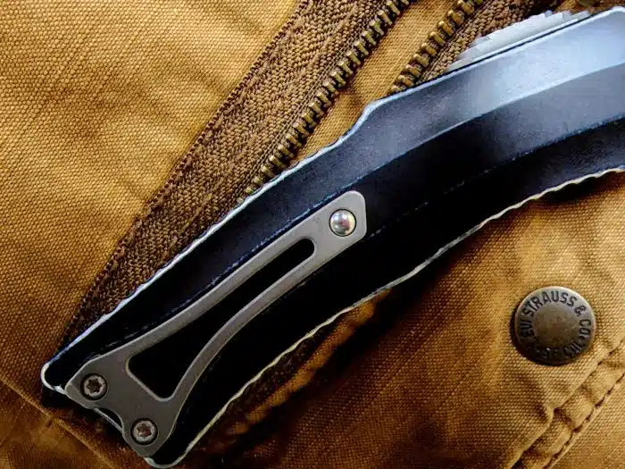 Heretic Knives ROC Single Edge OTF Curved Blade Battleworn Magnacut Black Aluminum H060-5A-Battle - Image 5