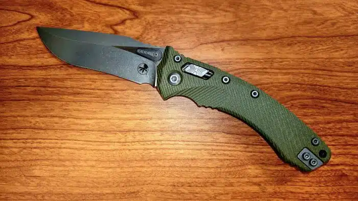 Microtech 137RL-10APFLGTOD Amphibian Apocalyptic Recurve Fluted OD Green G10 Ram-Lok