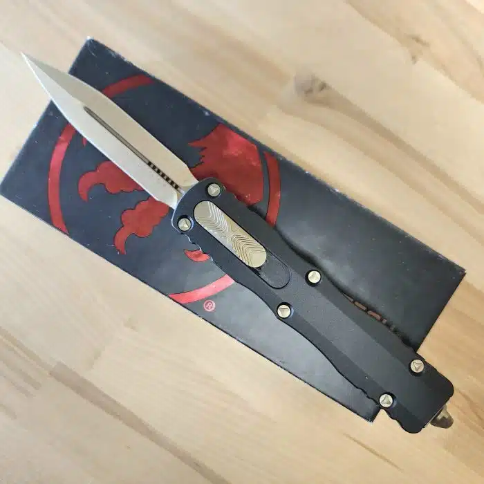 Preowned Microtech 227-13 Dirac Delta Bronzed M390 Dagger and Hardware Black Handle