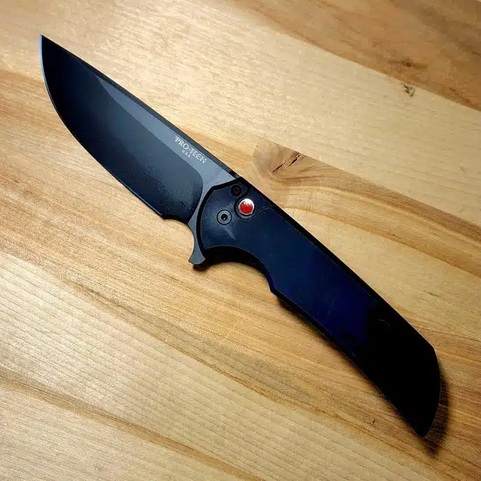 Protech Mordax Smooth Black Aluminum Black DLC Magnacut Red G10 Button Lock