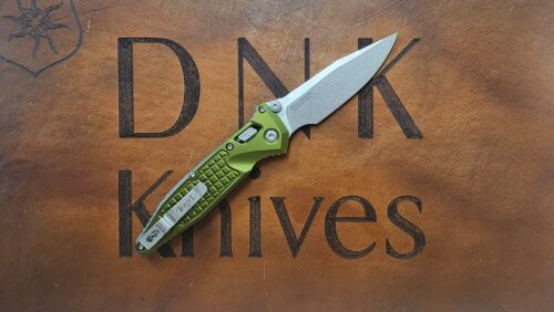 Microtech Socom Ram-Lok 160RL-10FROD Stonewashed M390MK Frag OD Green Aluminum Axis Cross Bar Lock