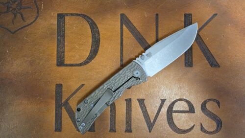 McNees Knives PM Mac 2 Jigged Bronze Titanium 3.5″ Atomic Magnacut Stonewash Drop Point