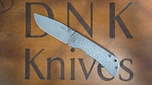 McNees Knives PM Mac 2 Jigged Stonewashed Titanium 3.5″ Atomic Magnacut Drop Point