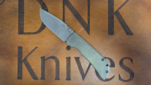 McNees Knives PM 2 3″ Green Bronze Tittanium Atomic Drop Point Magnacut