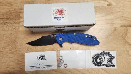 Preowned NEW Hinderer XM-18 3.5″ Bowie Frame Lock Folding Knife, Battle Black MagnaCut Bowie Blade & Battle Black Titanium with G-10 Handle