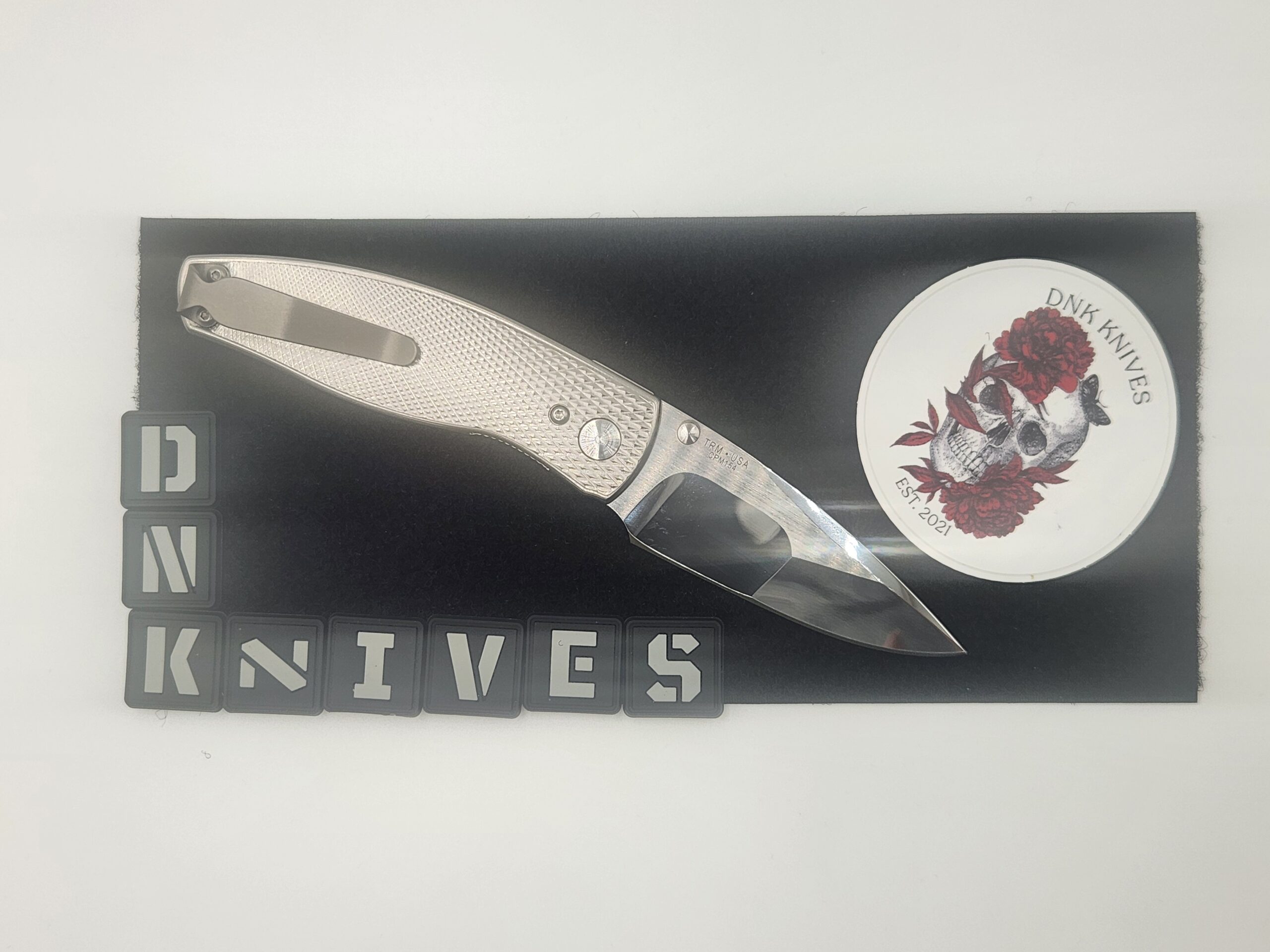 Three Rivers Manufacturing (TRM) Neutron 2 Titanium Folding Knife – Mike Irie Compound Ground Mirror-Polished CPM 154 Blade, Lizard Skin Titanium Handle Three Rivers Manufacturing (TRM) Neutron 2 Titanium Folding Knife – Mike Irie Compound Ground Mirror-Polished CPM 154 Blade, Lizard Skin Titanium Handle - Image 2