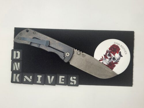 Preowned no box McNees Knives PM Mac 2 Atomic Blue/Bronze W/richlite Inlays Full flat GrindTitanium 3.5″ Magnacut Stonewash Drop Point